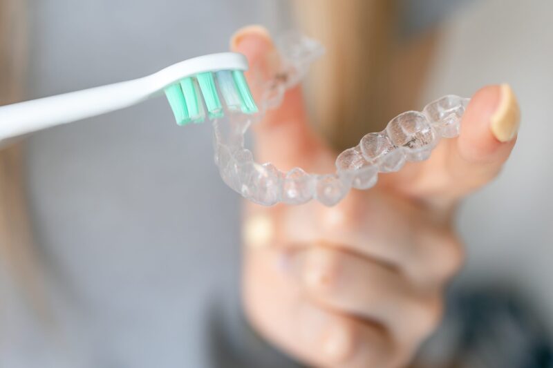 How to Clean Your Clear Aligners Clear Aligners Beaufort Coastal Orthodontics Clear Aligners